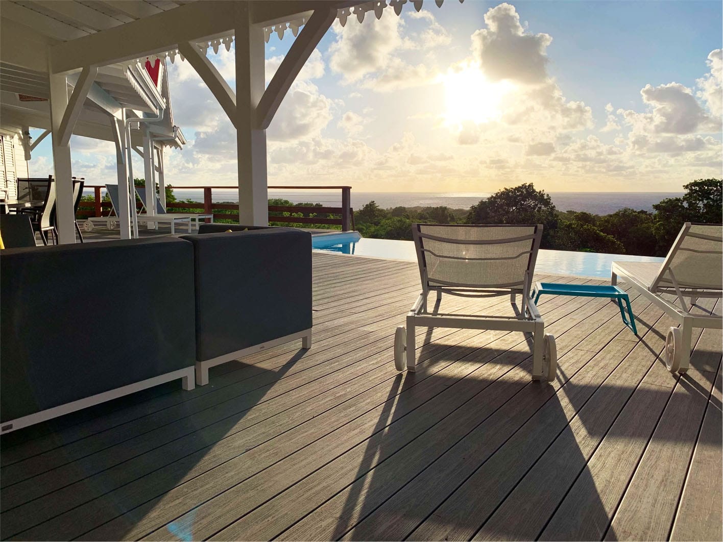 The villa deck facing the sea at sunset